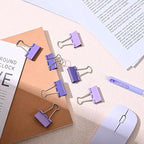 Temiary Aesthetic Binder Clips, 24 Pcs 1.26 Inches Small Metal Binder Clip with Clear Storage Container, Binding Paperwork Clamps for School Teachers Office Supplies (Purple)